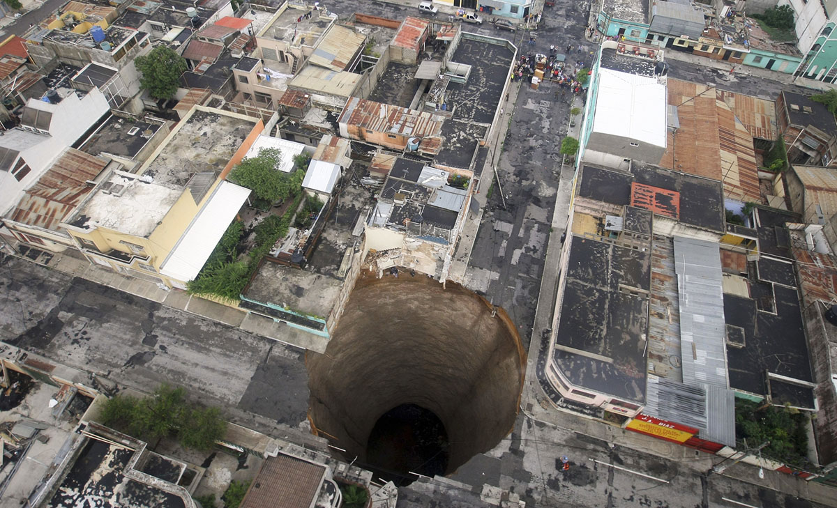 FUN. The Airgun Hole -- So Deep, So Wide. #01Bb. Guatemala City Sinkhole, Guatemala, 2888.jpg